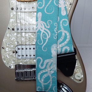 octopus guitar strap on teal
