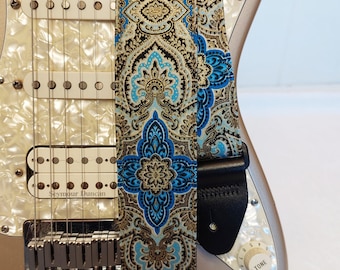 gold and blue paisley guitar strap