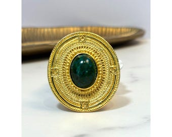 Broche vintage Ccori Perú: Artesanía inca bañada en oro con cabujón de turquesa.