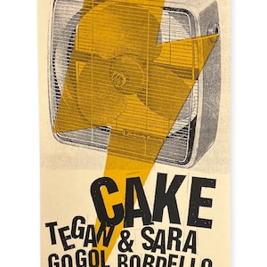 May include: A vintage-style poster with a cream background features a black and white image of a box fan overlaid with a yellow lightning bolt. The poster advertises a concert with the band "CAKE" and other artists, including Tegan & Sara, at the Celebrity Theatre Phoenix.