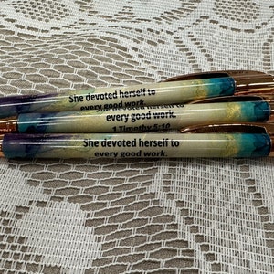 She devoted herself to every good work, 1 Timothy 5:10, rose gold Bible verse pen