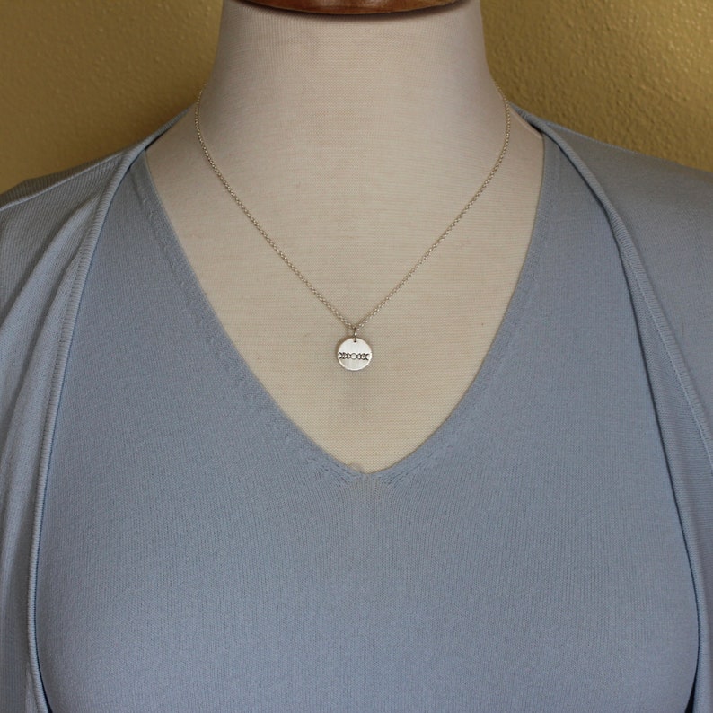 Tiny Moon Phases Necklace in Sterling Silver