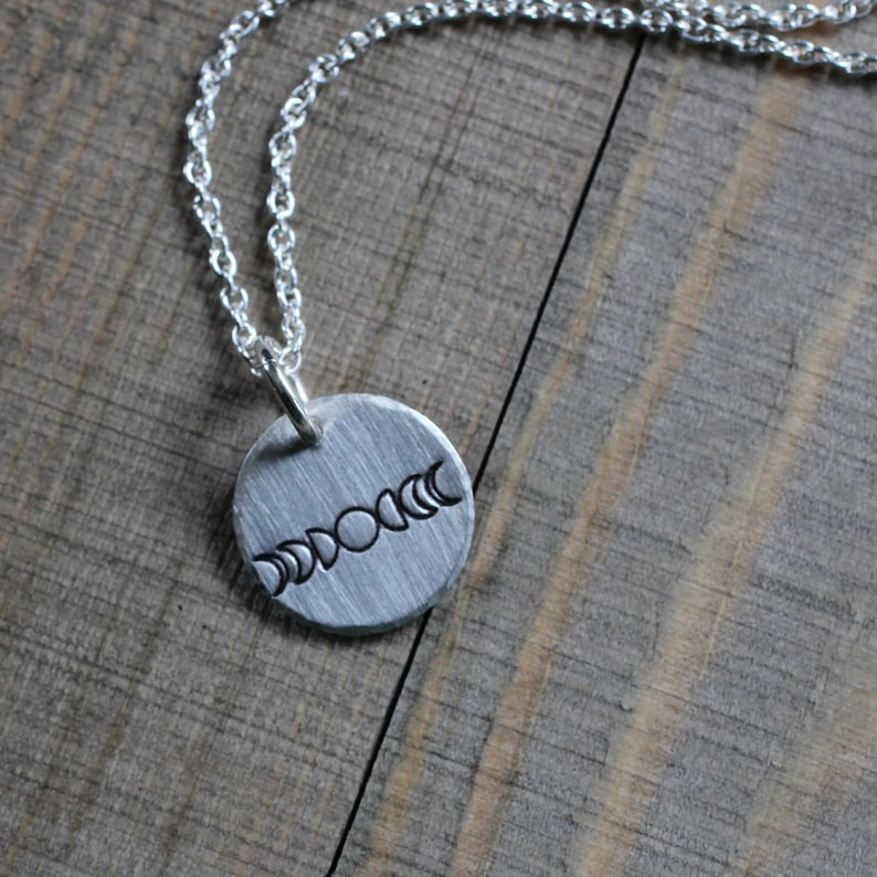 Tiny Moon Phases Necklace in Sterling Silver