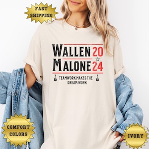 May include: A white t-shirt with the text "WALLEN 20 ☆ MALONE 24" and the phrase "TEAMWORK MAKES THE DREAM WORK" printed on it.