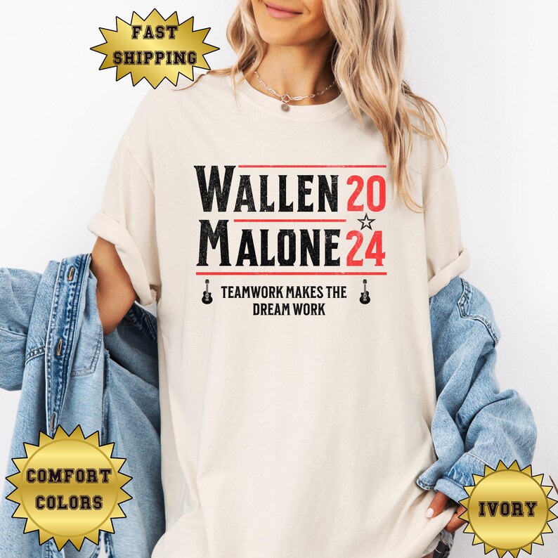 May include: A white t-shirt with the text "WALLEN 20 ☆ MALONE 24" and the phrase "TEAMWORK MAKES THE DREAM WORK" printed on it.
