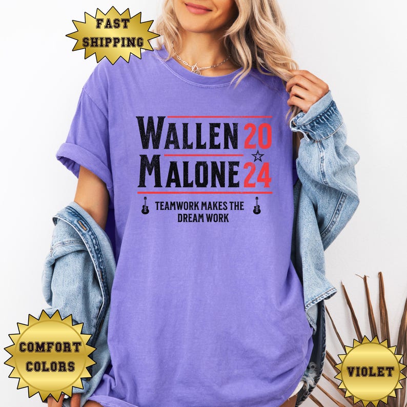 May include: A purple t-shirt with the text "Wallen 20 Malone 24" and the words "Teamwork makes the dream work" printed on it.