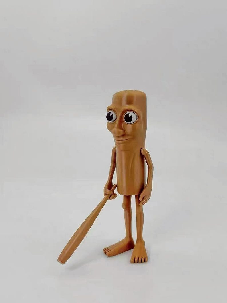 May include: A brown figurine of a person with large eyes and a wooden baseball bat. The figurine is standing with its legs slightly apart and its arms bent at the elbows. The figurine is made of a smooth, brown material.