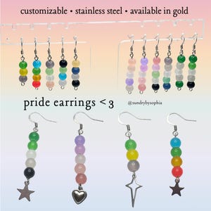 May include: A collection of colorful beaded earrings, displayed on a clear stand. The earrings feature various color combinations, including rainbow and pastel hues. Text on the image reads "pride earrings <3" and "customizable • stainless steel • available in gold".