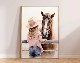 May include: Watercolor print of a girl in a pink plaid shirt and jeans, wearing a hat, petting a brown horse. The horse has a white blaze and a bridle. The artwork is framed and set against a neutral background, evoking a rustic, country theme.