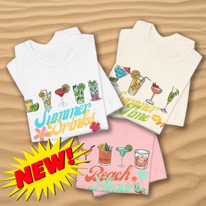 May include: Three white t-shirts with different summer drink designs. The first shirt says "Summer Drinks" and features a variety of cocktails. The second shirt says "Summer Time" and features a variety of cocktails. The third shirt says "Beach Please" and features a variety of cocktails. The shirts are laid out on a sandy surface.