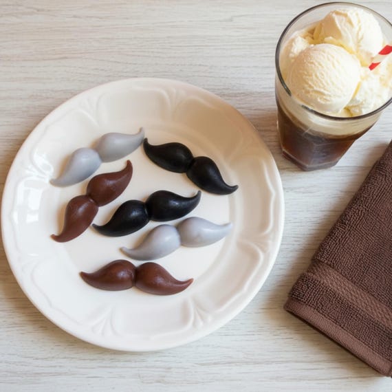 Root beer float-scented handmade soaps cast in a mustache mold — 92 favorites confirms this novelty soap punches well above its $7 price as a party favor or stocking stuffer.