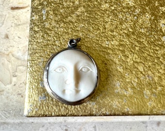 carved bone face charm in sterling silver - handmade and one of a kind jewelry -charm necklace