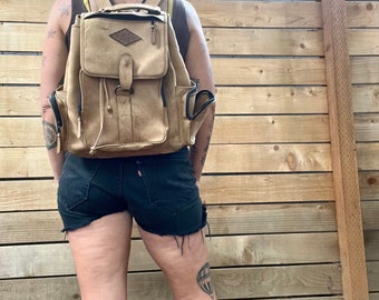 Vintage bruinleren rugzakaccessoires uit de jaren 80/90