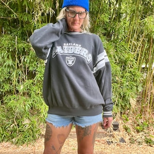 NFL Oakland Raiders signierte / handsignierte 1990er Jahre Pullover Sweatshirt Männer oder Frauen Größe L