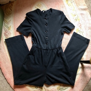 Black 1980’s vintage short sleeve jumpsuit women’s size small/medium
