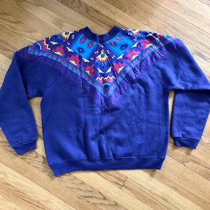 Rad women’s vintage 1990’s Tultex southwestern print pullover sweatshirt. Size large
