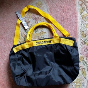 Deadstock Jordache 1980’s black and yellow duffle nylon gym athletic bag