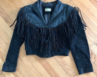 Rad women’s vintage 1980’s black leather fringe cropped western jacket. Size xsmall/small