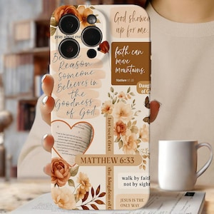 May include: A phone case with a floral design in shades of peach, cream, and brown. The case features inspirational quotes and Bible verses, including "faith can move mountains" and "Matthew 6:33". The case has a camera cutout and a white background.