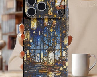 May include: A black phone case featuring a stained-glass design with a night scene. The artwork depicts lanterns, foliage, and reflections in shades of blue, yellow, and brown. The case has a glossy finish and a camera cutout.