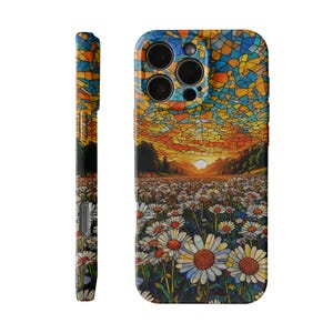 May include: A phone case with a stained-glass effect depicting a sunset over a daisy field. The case design wraps around the sides, showing the floral and sunset scene. The case is designed for a smartphone, with a focus on the artistic design.