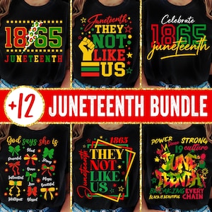 May include: A selection of black t-shirts with Juneteenth designs. The shirts display text and graphics in red, green, yellow, and white, including the years 1865, phrases like "They Not Like Us", and the words "Juneteenth" and "Celebrate".