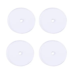 May include: Four clear plastic discs with a small hole in the center. The discs are approximately 2 inches in diameter.