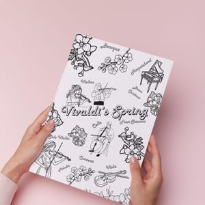 May include: A white sheet of paper with the words "Vivaldi's Spring" in a decorative font, surrounded by line drawings of musical instruments and floral elements. The paper is held against a pink background.