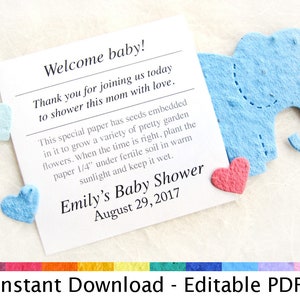 K&ouml;nnte beinhalten: Eine wei&szlig;e Karte mit blauen und rosa Papierherzen und einem blauen Papier-Elefanten. Die Karte sagt "Willkommen Baby!" und "Emilys Baby Shower 29. August 2017". Die Karte sagt auch "Dieses besondere Papier enth&auml;lt eingebettete Samen, aus denen eine Vielzahl h&uuml;bscher Gartenblumen wachsen. Wenn die Zeit reif ist, pflanzen Sie das Papier 6 mm tief in fruchtbaren Boden, an einen sonnigen Ort, und halten Sie es feucht."