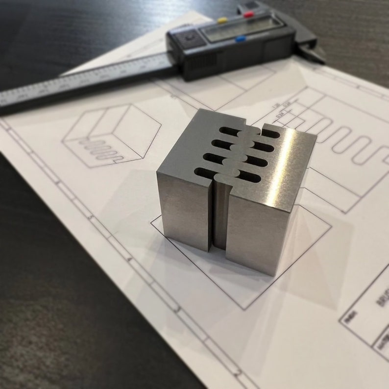 Wiron Cube™ Wire EDM Zigzag Puzzle Pieces. High Precision Fidget Desk