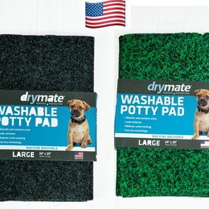 May include: Two large, machine washable pet potty pads. One pad is black and the other is green with a grass print. Both pads feature the drymate logo and the text "Washable Potty Pad".