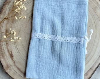 Pastel blue health book cover with white lace to personalize