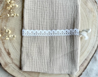 Beige health book cover with white lace to personalize