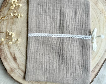 Beige health book cover with white lace to personalize