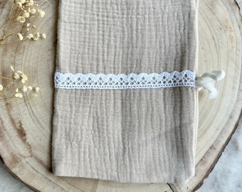 Beige health book cover with white lace to personalize
