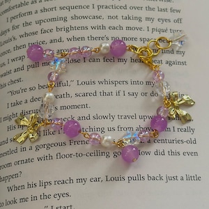 purple beaded charm bracelet gold bow ribbon charms handmade cute jewelry pearl and crystal bead aesthetic bracelet adjustable gift for her