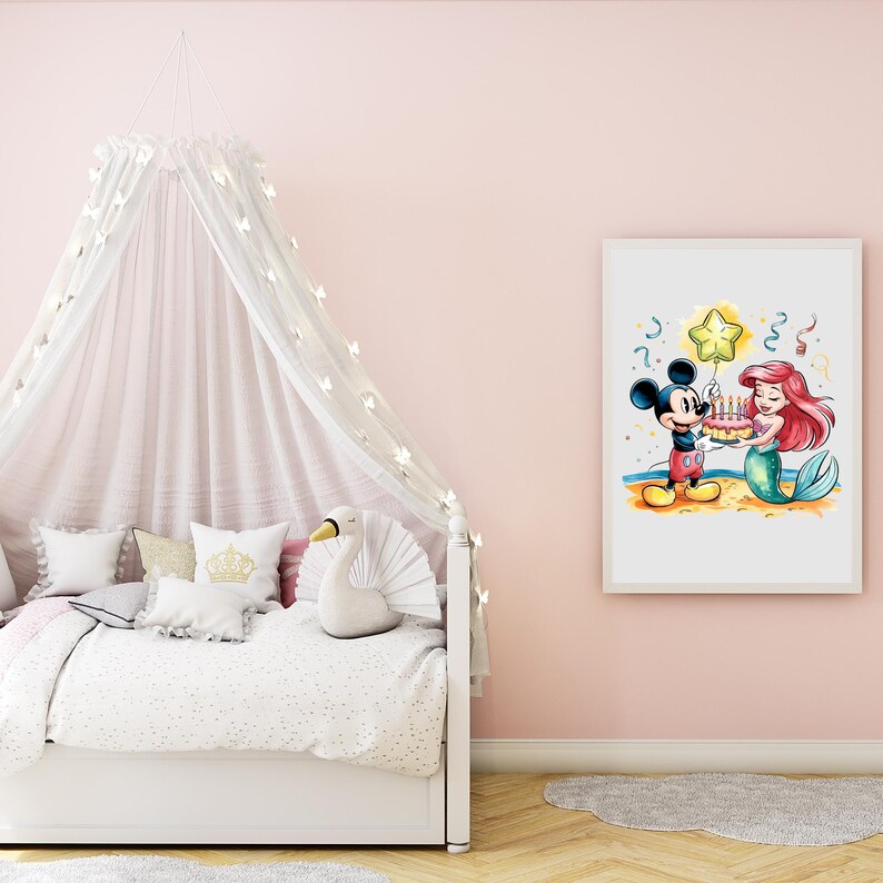 May include: A white framed print featuring a cartoon illustration of Mickey Mouse and Ariel the Mermaid celebrating a birthday with a cake and a star-shaped balloon. The background is a light blue watercolor wash.
