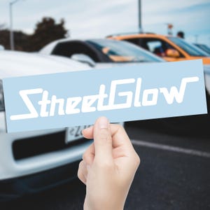 Peut inclure: Panneau en bois rustique avec l'inscription "Welcome to our home" en lettres blanches. Le panneau présente une finition vieillie et un design simple et accueillant, idéal pour une entrée.