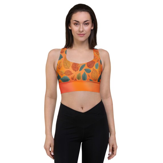 Recycled Longline Sports Bra with Fall Leaves on Orange Gradient – Eco-Friendly Autumn Workout Top