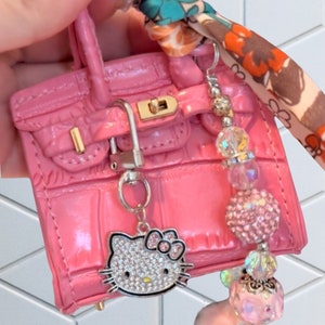 Hello kitty coach purse shop