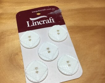 Lincraft card of white fancy plastic buttons x 5