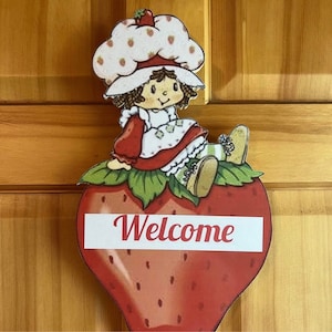 Strawberry Shortcake Welcome sign cut out wooden hand cut plaque hanger vintage style ready to display with hardware attached to back