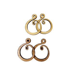 May include: Two pairs of wooden earrings with a simple, elegant design. The earrings are made of natural wood and have a light brown color. The earrings are in the shape of a circle with a small loop at the top.