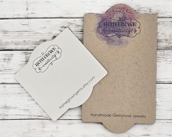 May include: Two white business cards with the text "Homegrown & creativity" and the website "homegrowngeems.etsy.com". The cards are on a brown background with the text "Handmade Gemstone Jewellery".