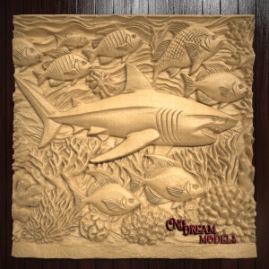 May include: A detailed wood carving of a shark swimming through a coral reef with various fish. The carving is in a light brown color and has a realistic texture.