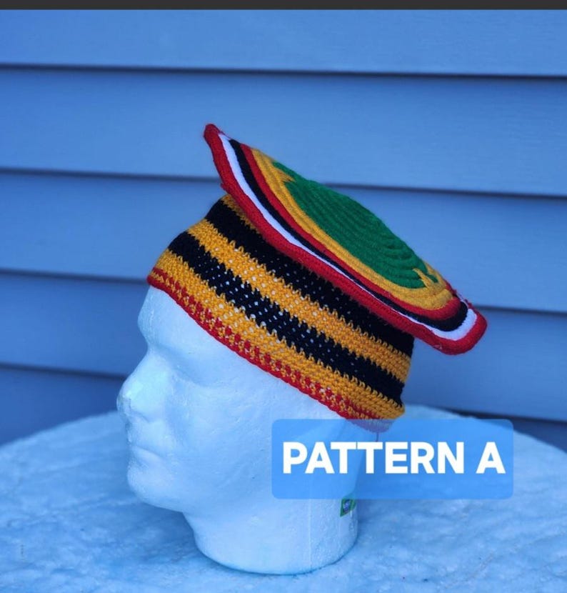 May include: A colorful crocheted hat with a brim, displayed on a mannequin head. The hat features a pattern of black, yellow, red, green, and white stripes. The text "PATTERN A" is displayed on a blue background.
