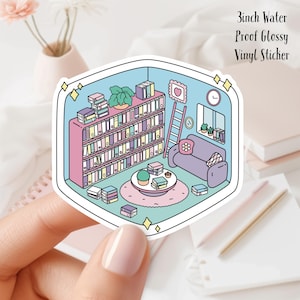 May include: A 3 inch water proof glossy vinyl sticker featuring a cartoon illustration of a bookshelf filled with books, a couch, a ladder, a coffee table with a plant and books, and a window with a plant. The sticker is on a white background.