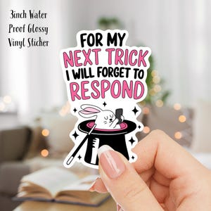 May include: A white rabbit wearing a pink bow tie is peeking out of a black top hat with a white brim. The hat is on a white background with pink stars. The text "FOR MY NEXT TRICK I WILL FORGET TO RESPOND" is written in black and pink letters.
