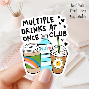 May include: A 3 inch water-proof glossy vinyl sticker with the text "Multiple Drinks at Once Club" and illustrations of a coffee cup, a water bottle, and a milkshake.