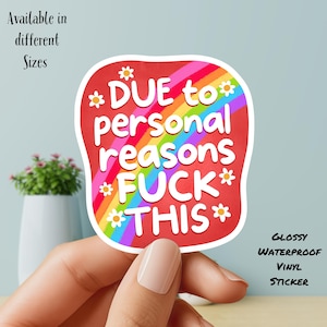 May include: A red, glossy, waterproof vinyl sticker with the text "DUE to personal reasons FUCK THIS" in white. The sticker has a rainbow and daisy design. The text "Available in different Sizes" is also present.